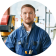 mechanic-posing-at-modern-factory-2021-09-24-03-52-25-utc.png
